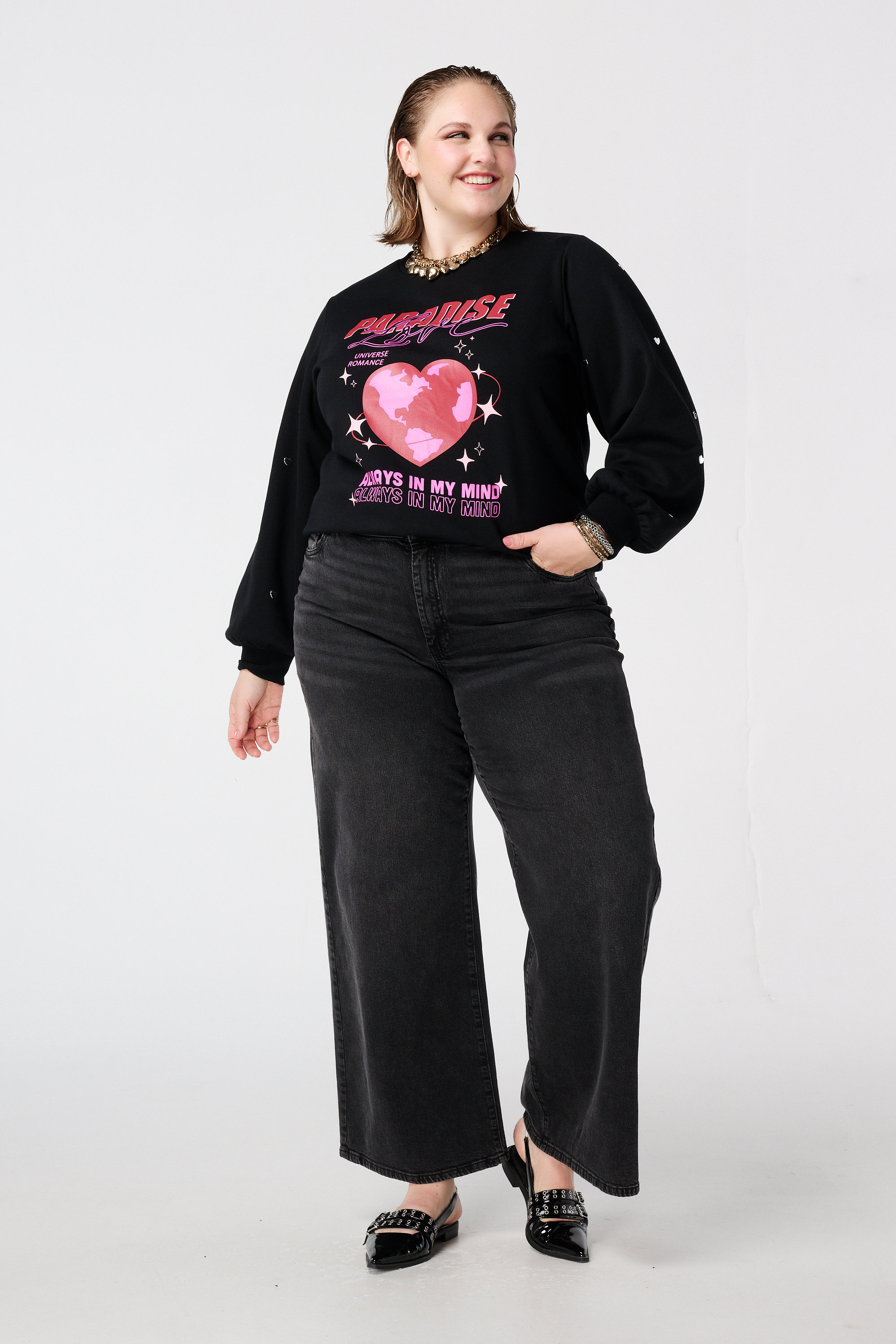 Sweater met print en hartjes Zwart