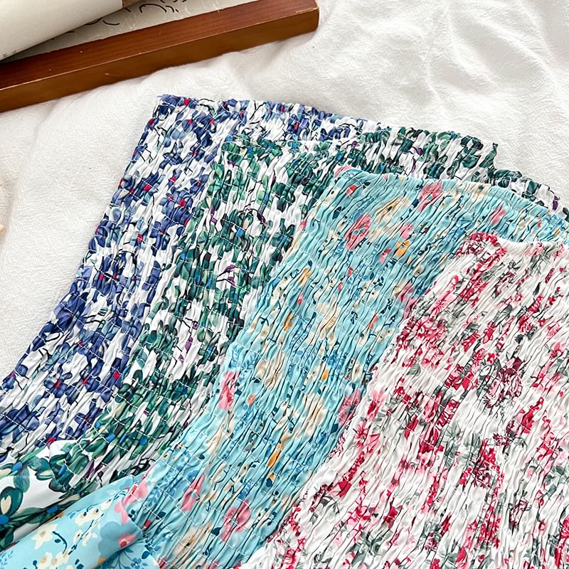 Babique - Romper met bloemenprint en smokwerk