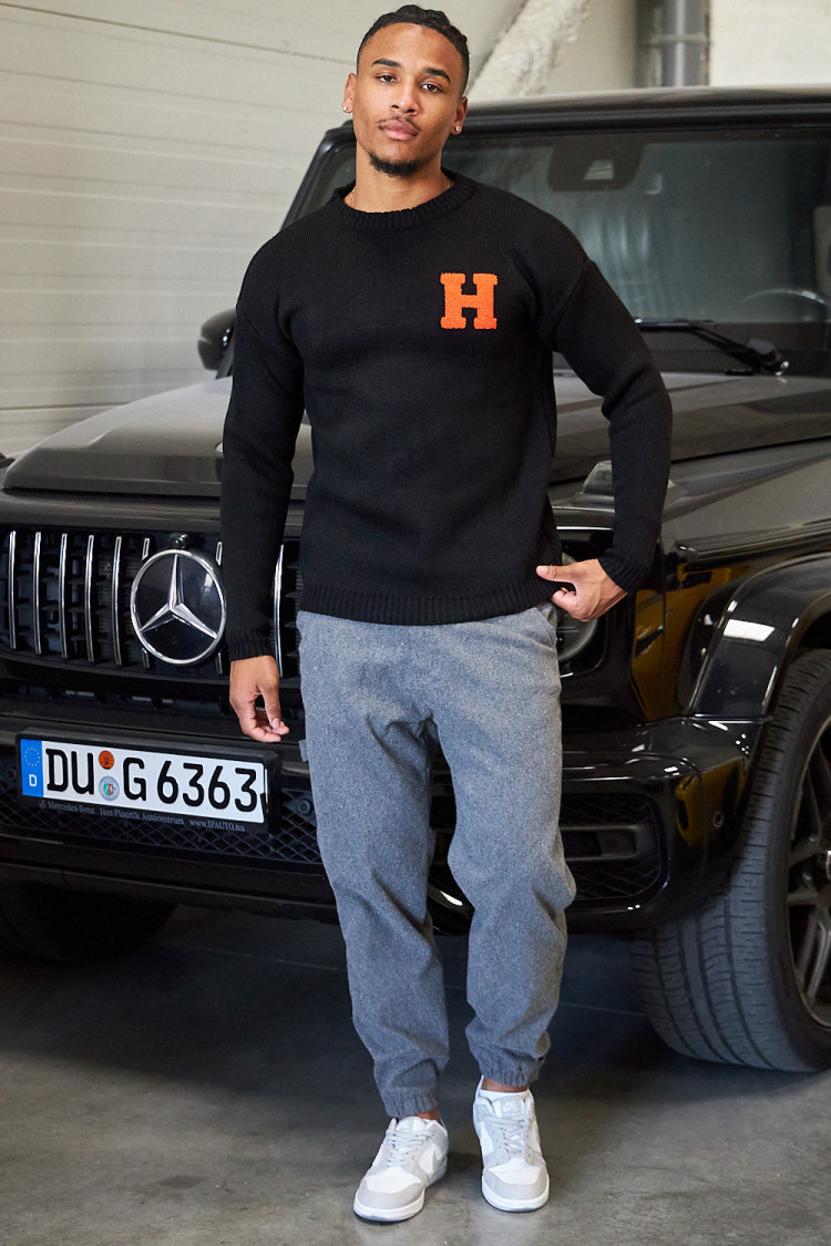 Pull noir en maille à logo 