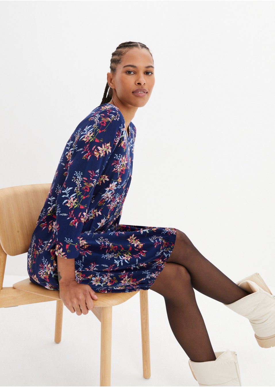 Robe en viscose avec poches en forme de O, sous-genou