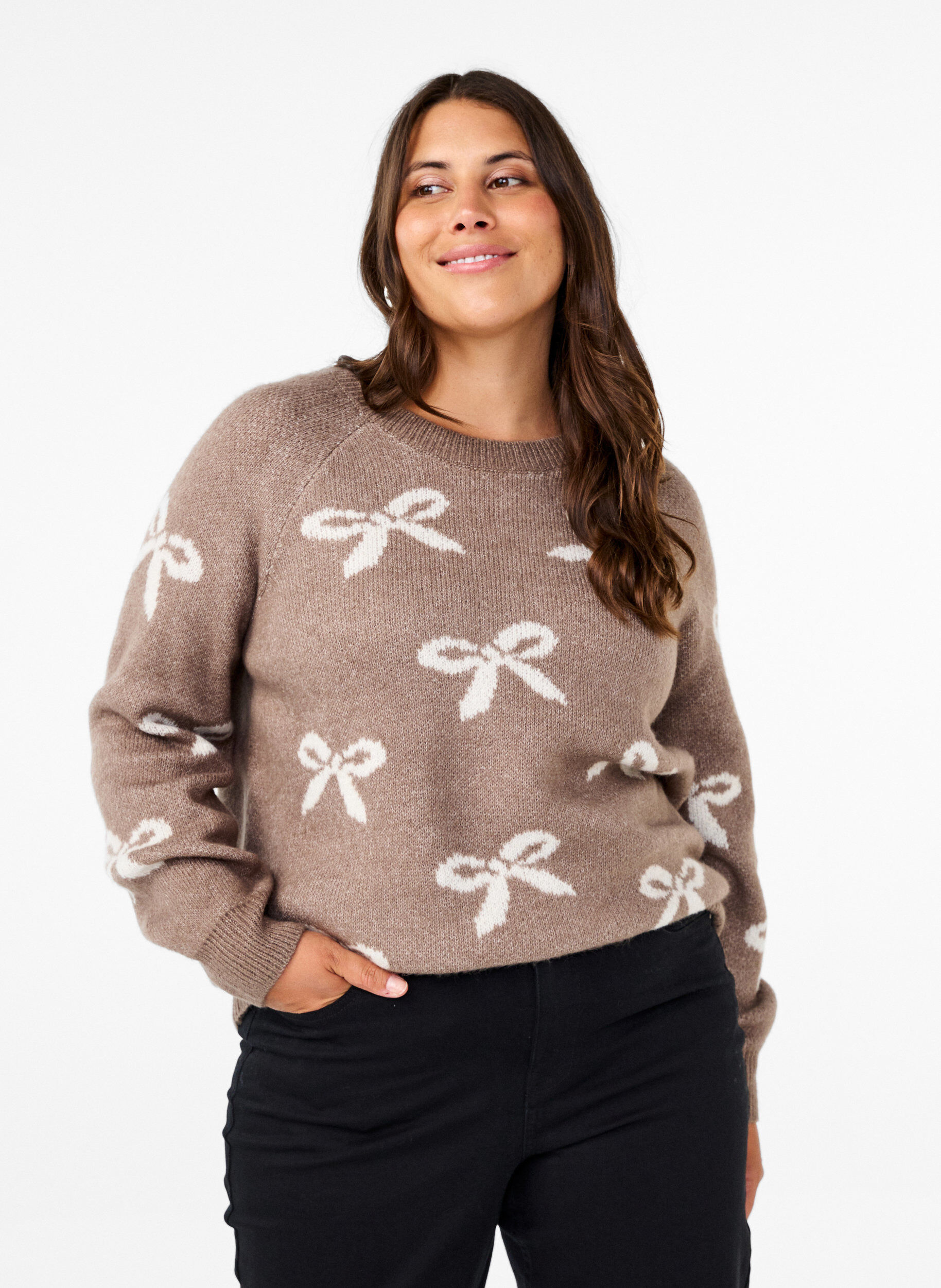 Strikbluse med sløjfer
