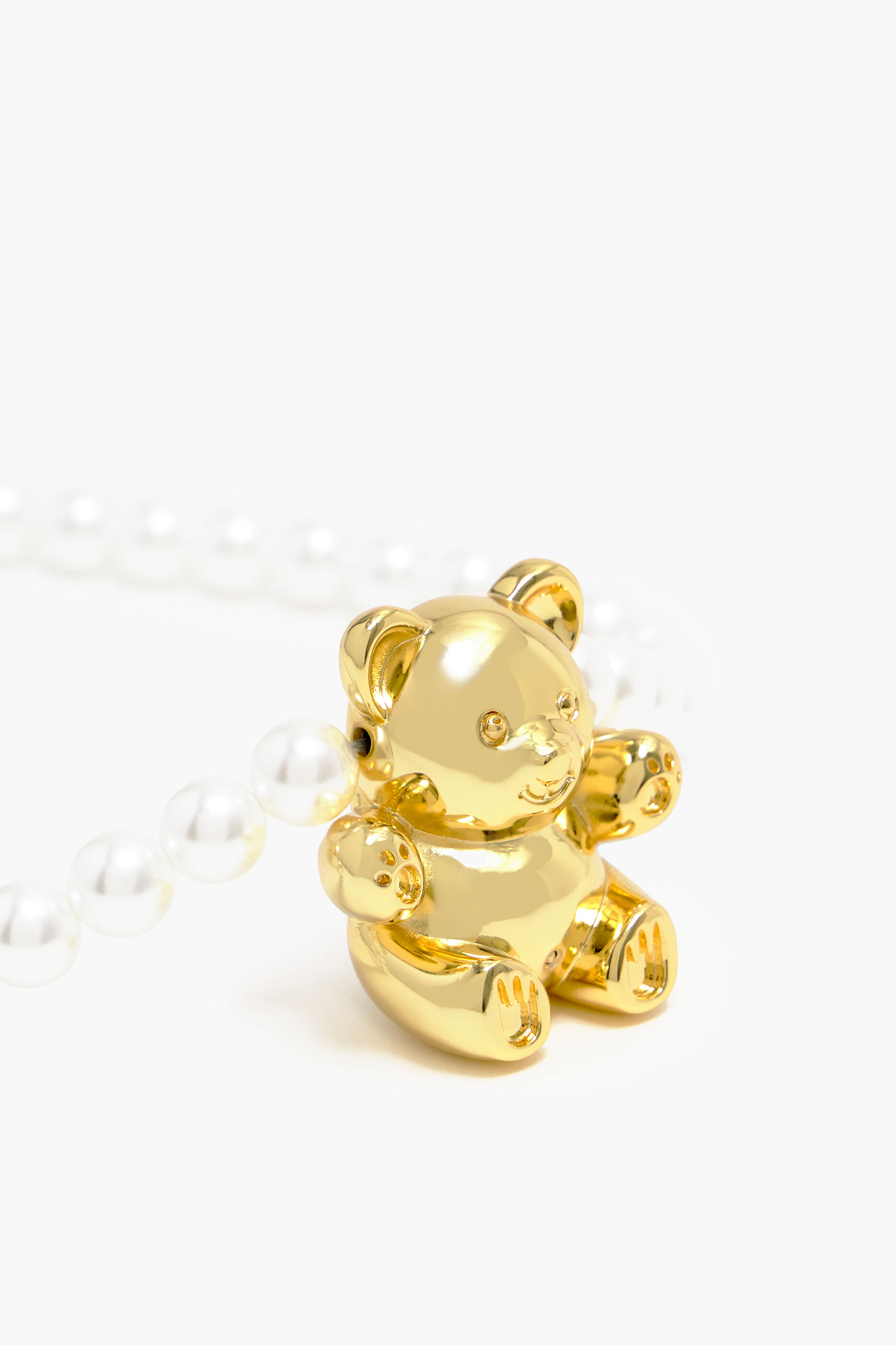 Colar de pérolas em forma de urso dourado