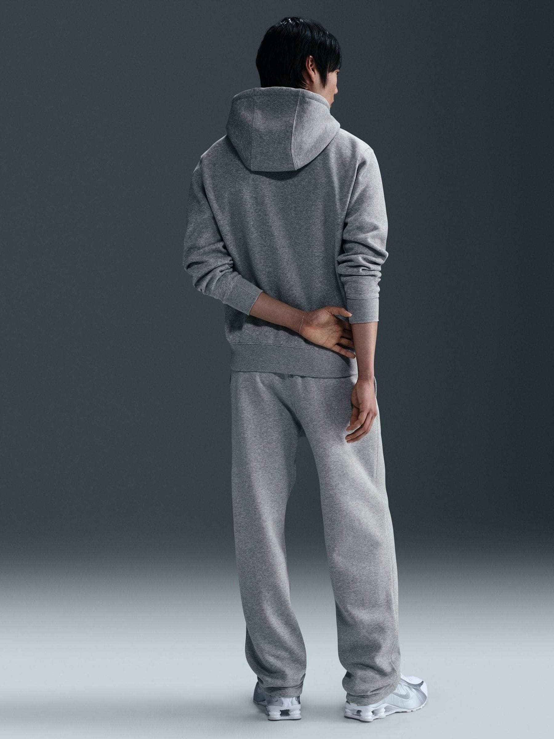 Donkergrijs gemêleerd - Nike Club Fleece joggingbroek met wijde pijpen