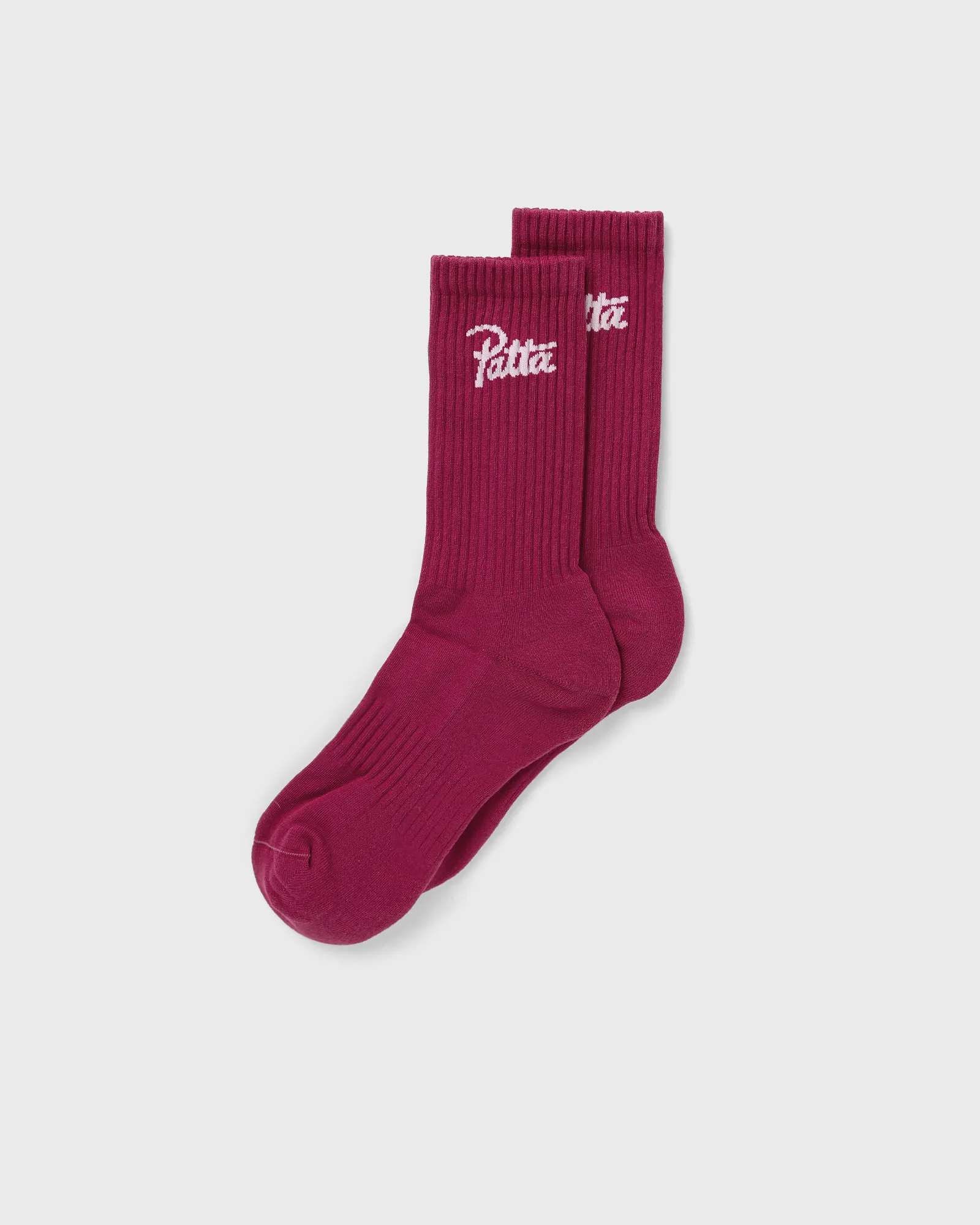 Meias esportivas com o logotipo PATTA em estilo cursivo.