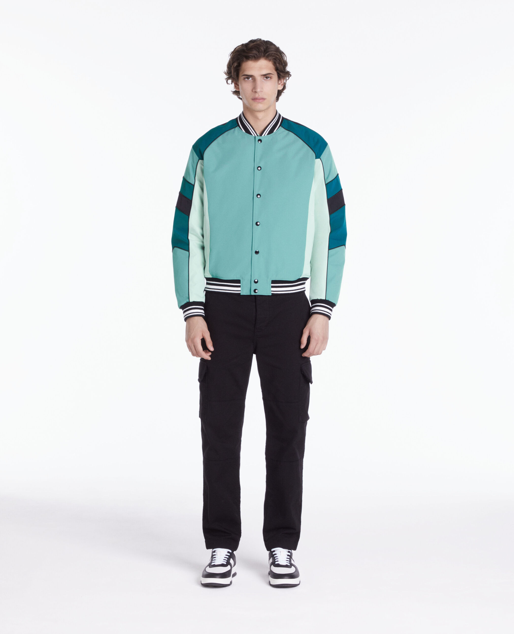 Blouson bleu et vert avec patchwork