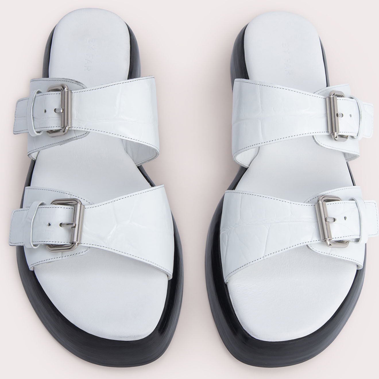 By Far Mules en Cuir Wyatt blanches