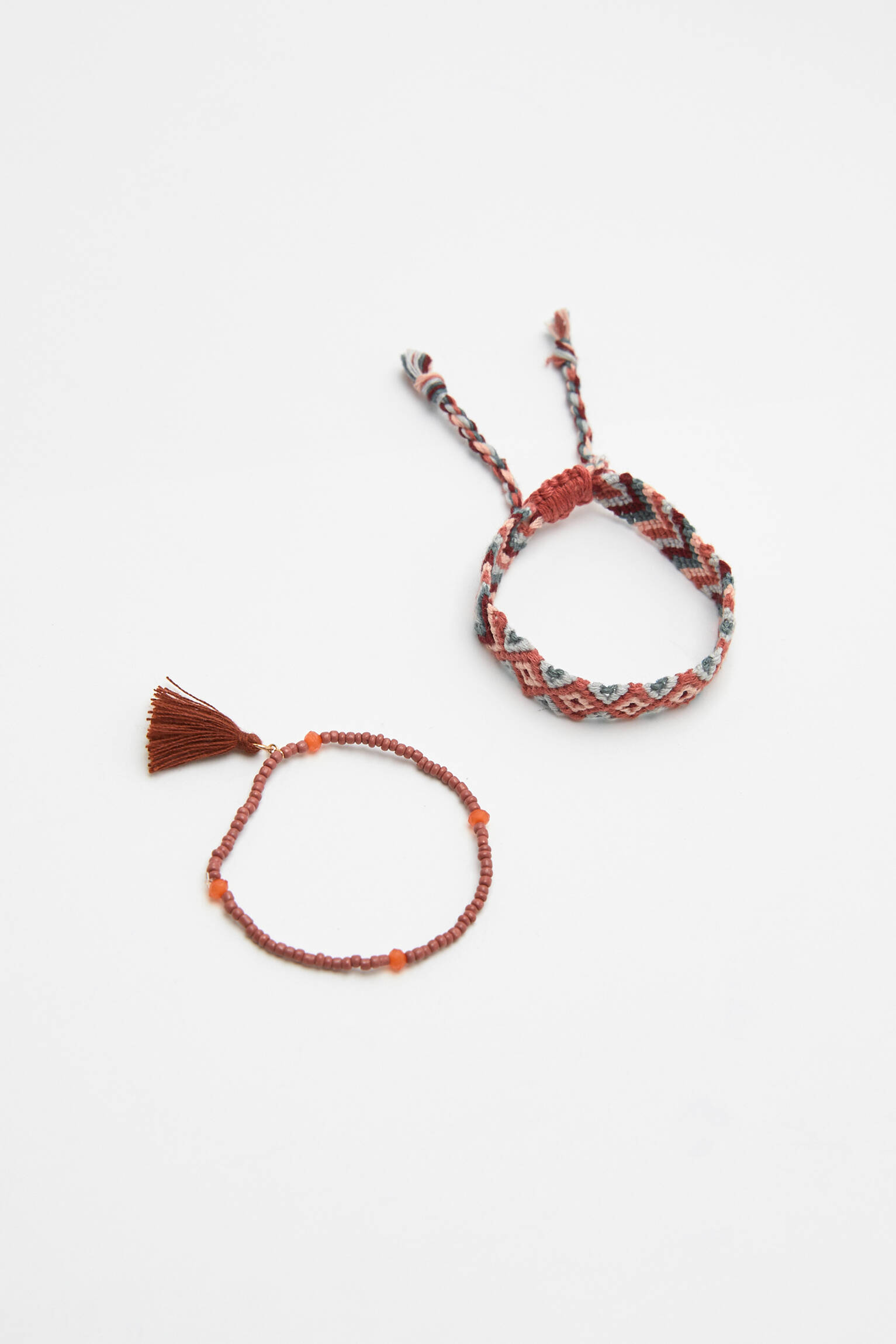 PACOTE COM 4 PULSEIRAS DE LINHA - ROSA DE LA
