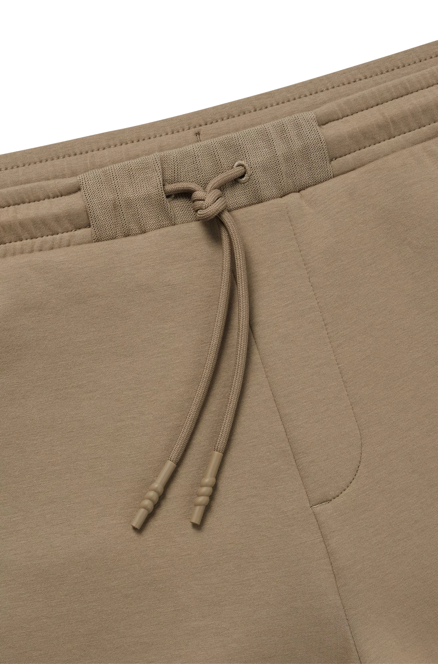 Calça de fato de treino BOSS verde em mistura de algodão com logótipo em relevo