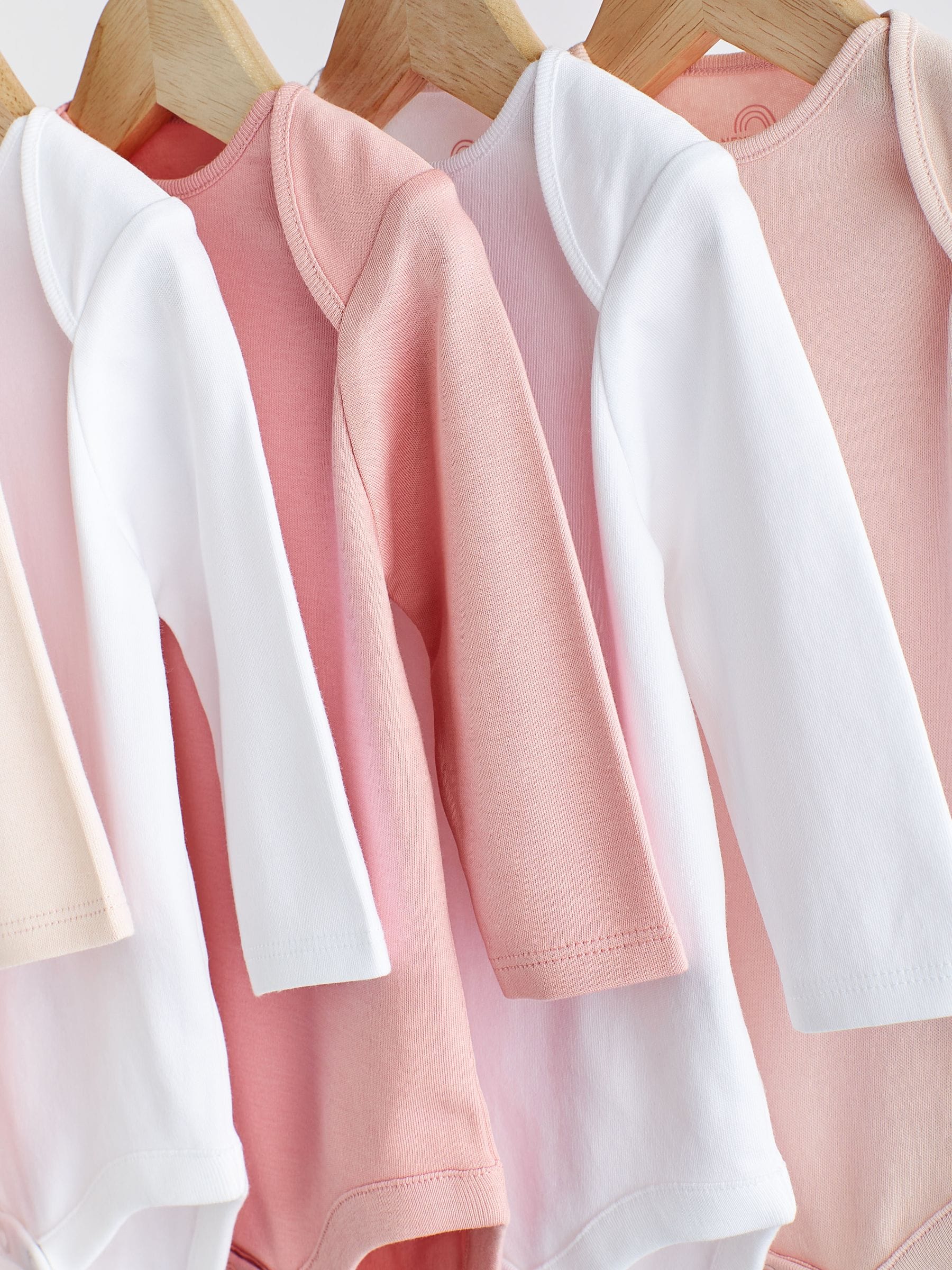 Roze/wit - Onmisbare rompertjes met lange mouwen