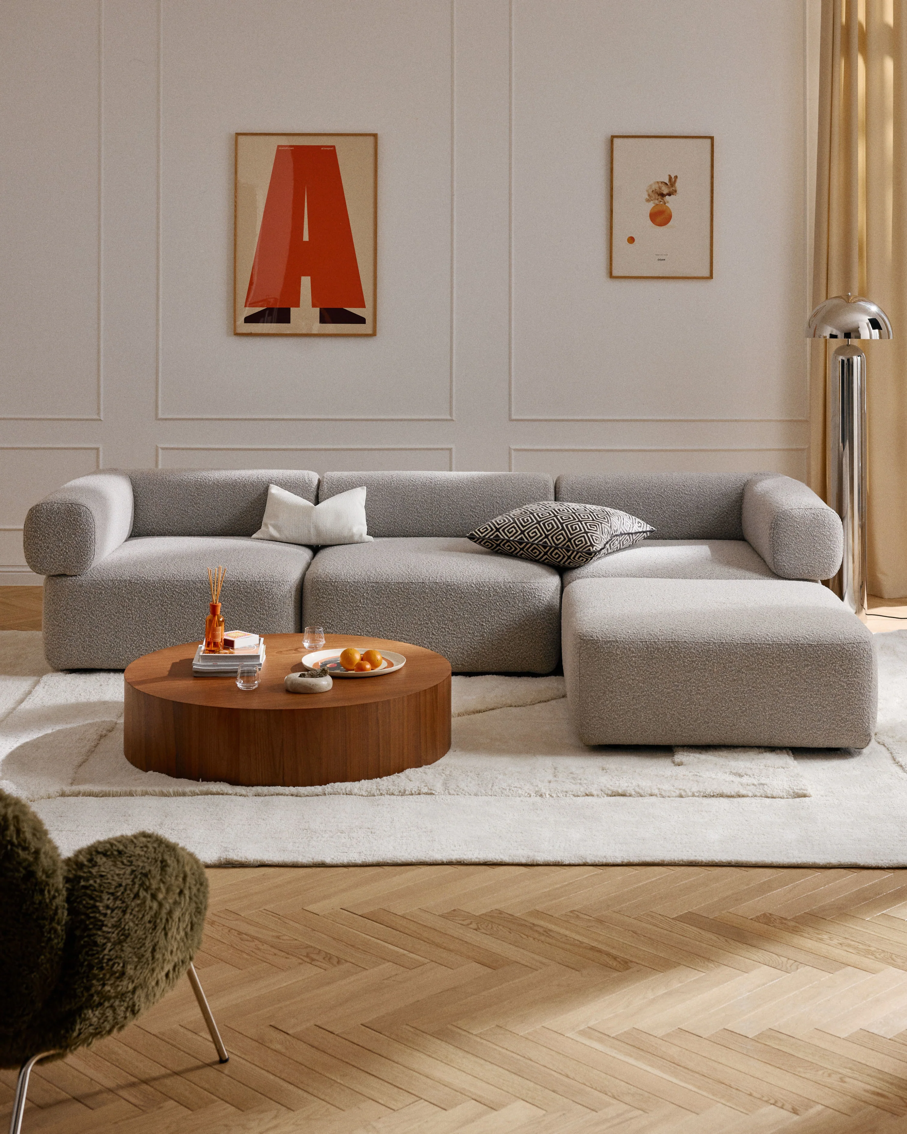 Modulaire bank Anton (4-zits) met poef (links/rechts) van bouclé