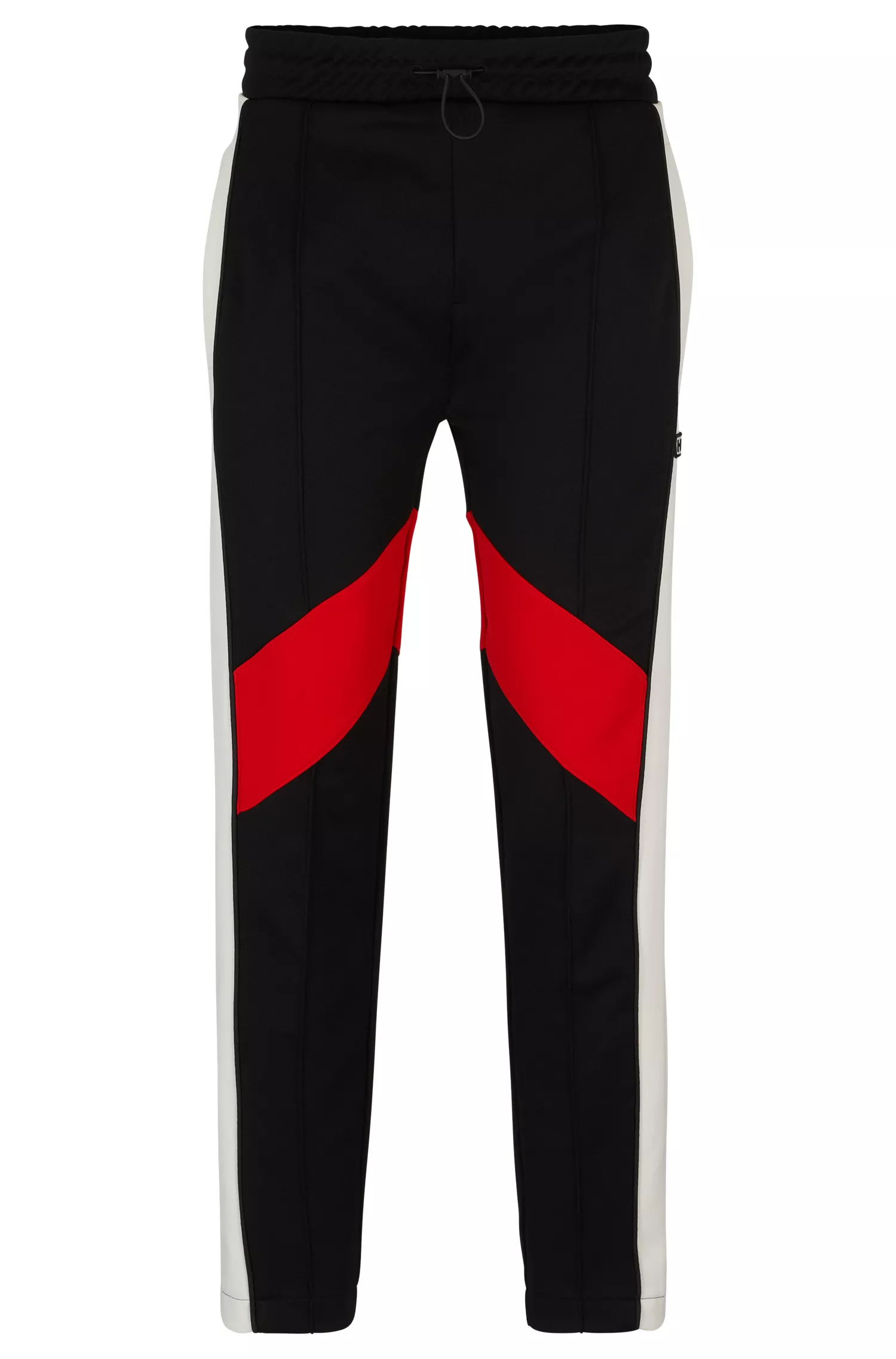 Calça de fato de treino HUGO vermelha, corte descontraído e com blocos de cor.