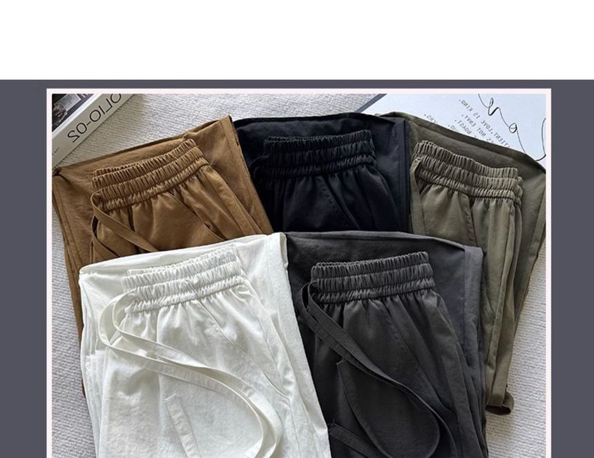 evanesce - Hoge taille trekkoord effen wijde pijpen parachute cargo joggingbroek