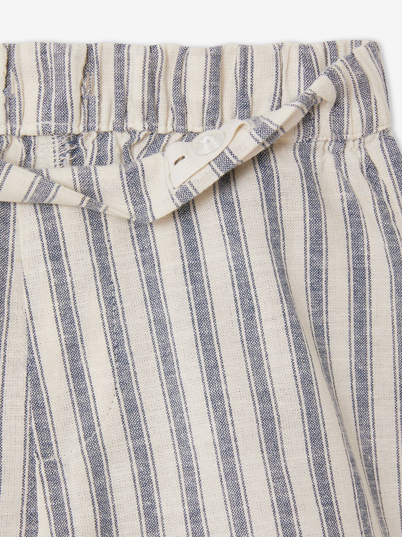 Conjunto listrado para meninas, composto por blusa sem mangas com babado e shorts combinando, listrado em branco escuro.