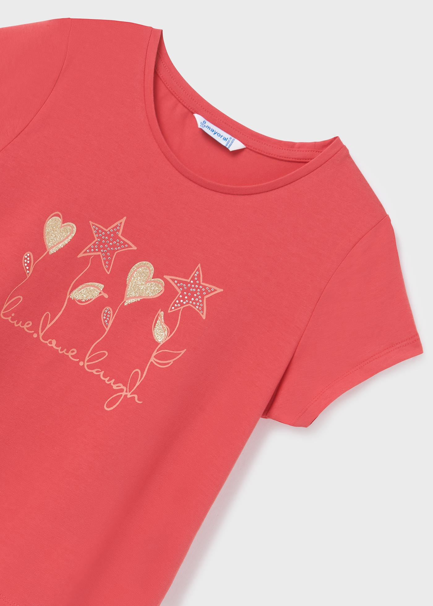 Camiseta de manga curta para meninas, feita de algodão sustentável.