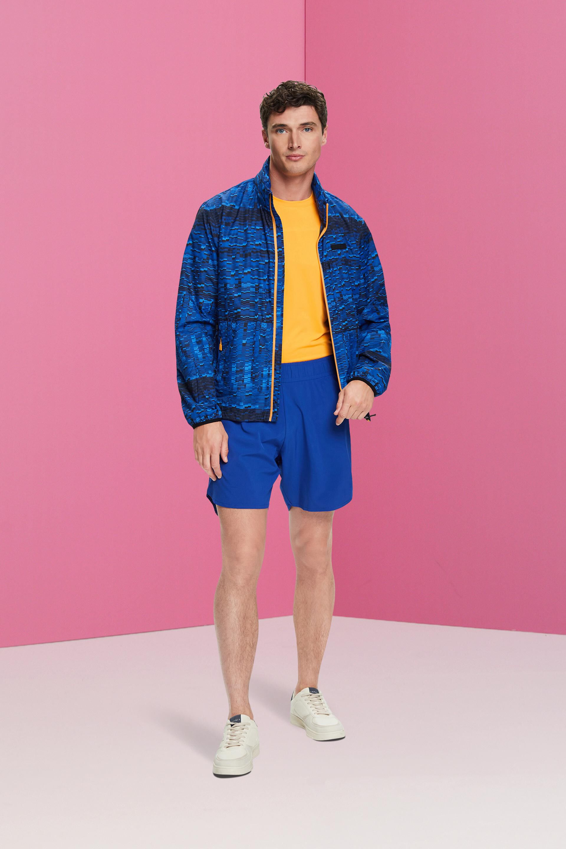 Short de sport à poches zippées