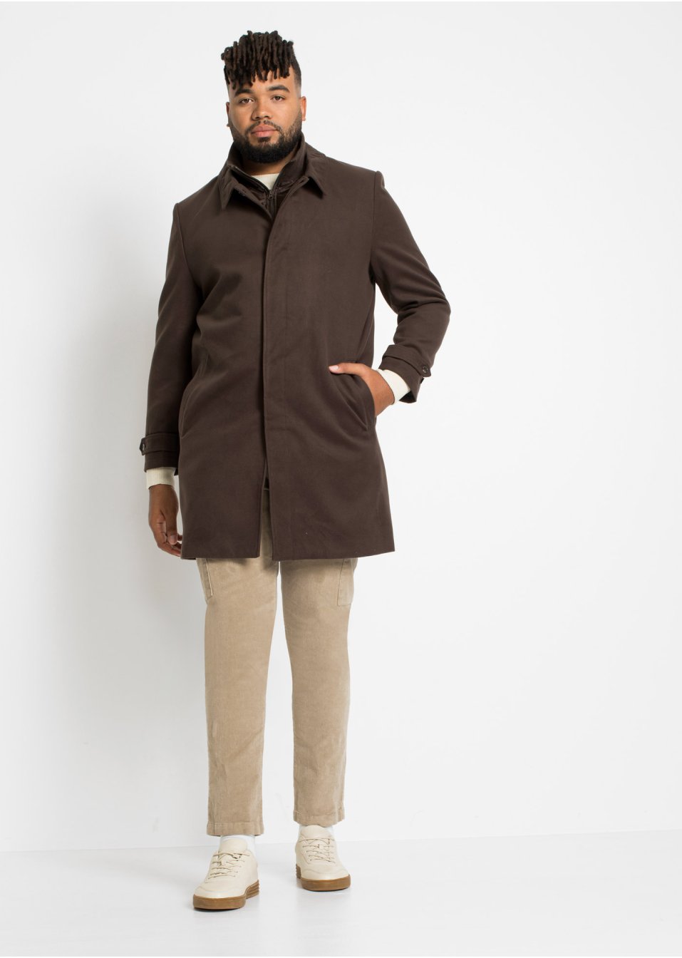 Manteau court avec empiècement coupe-vent