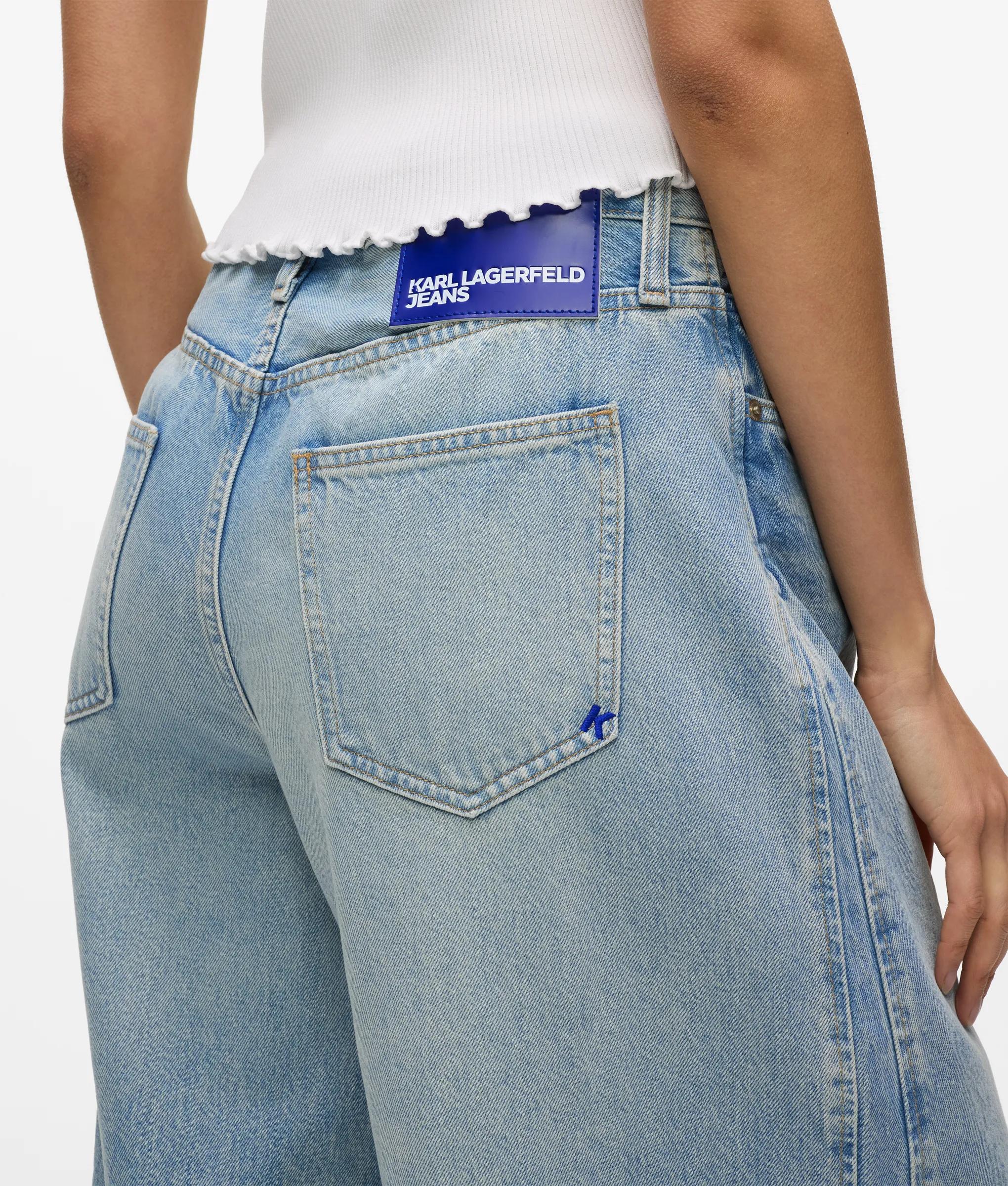 Laag model jeans met wijde pijpen en panelen