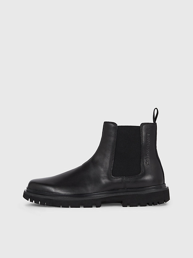 botas de couro até o tornozelo