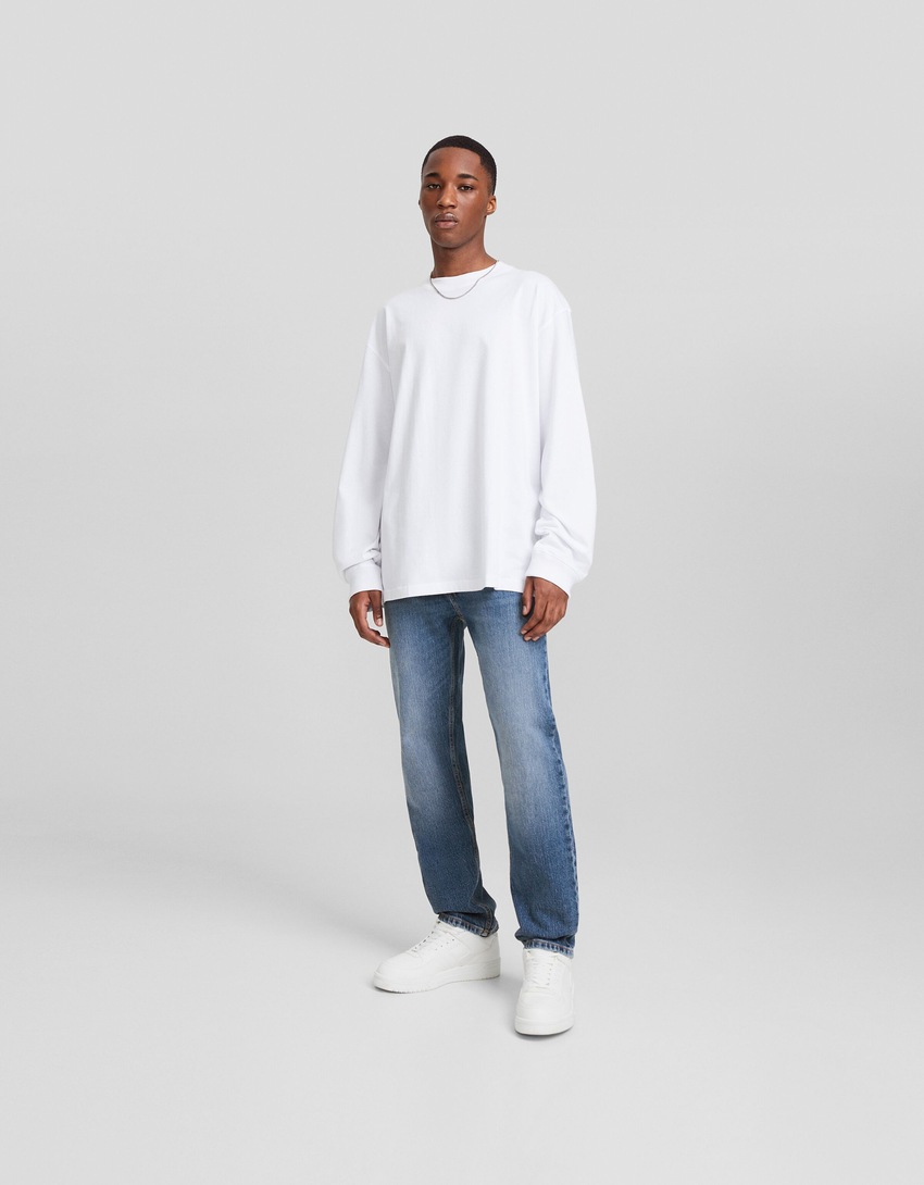 calça jeans de corte justo