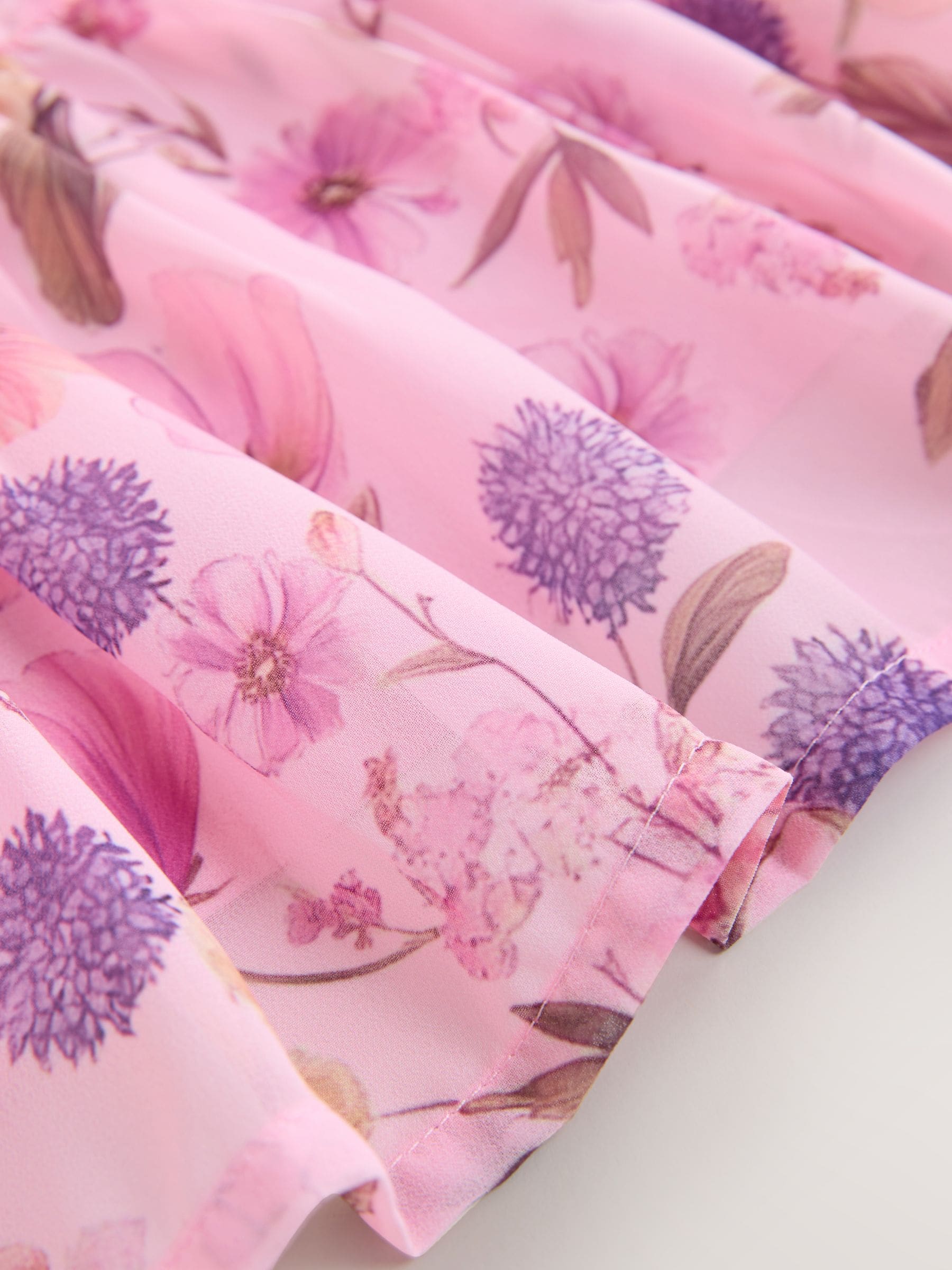 Lichtroze met bloemenprint - Chiffon jurk (3-16jr)