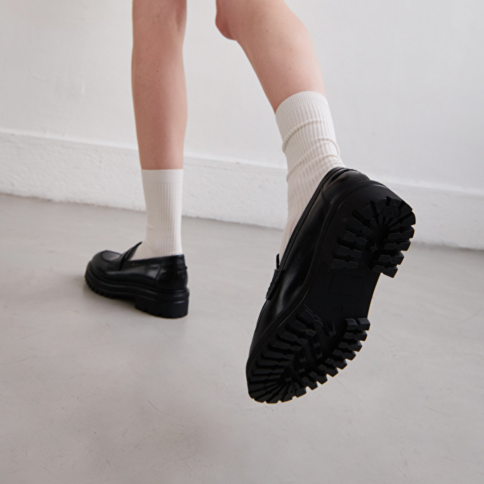 Mocassins à semelles crantées  en cuir noir