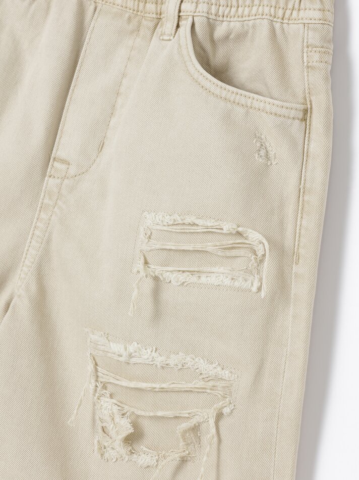 Bermuda jeans com rasgos - Bege claro