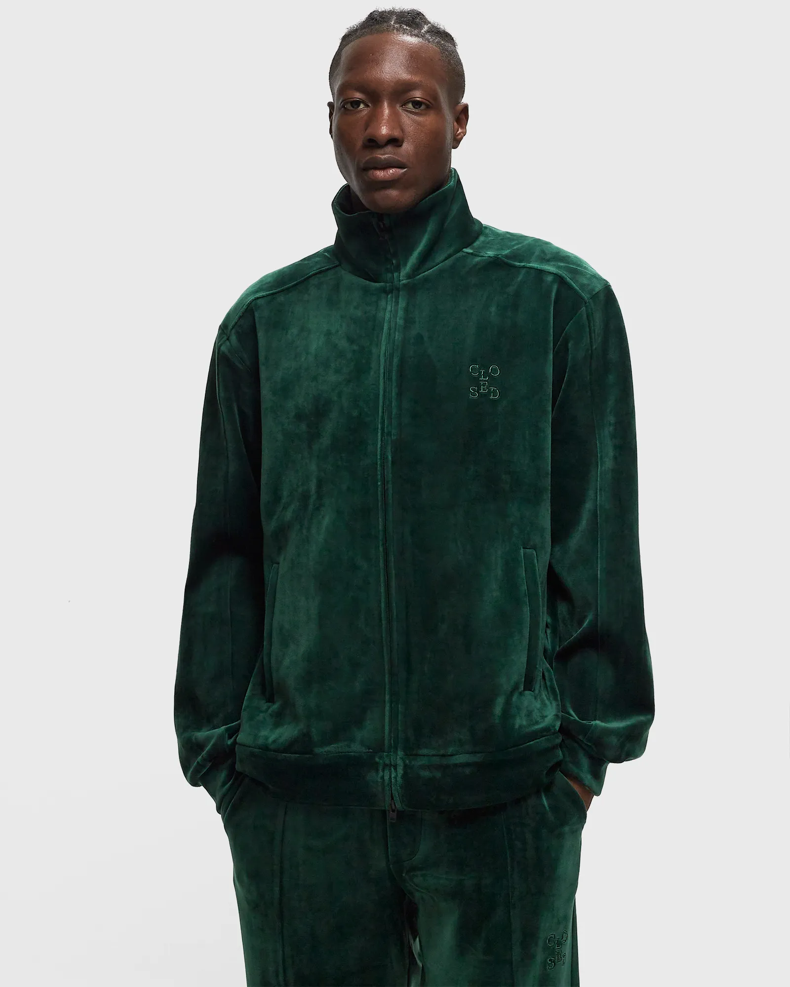 CLOSED TRACK TOP WITH WELT POCKETS