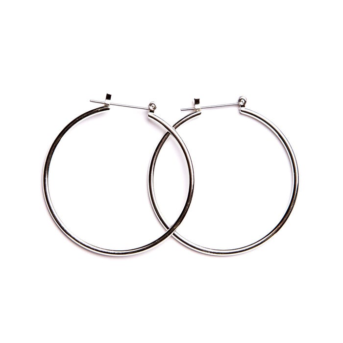 Veritas-Oorring met diameter 4 cm