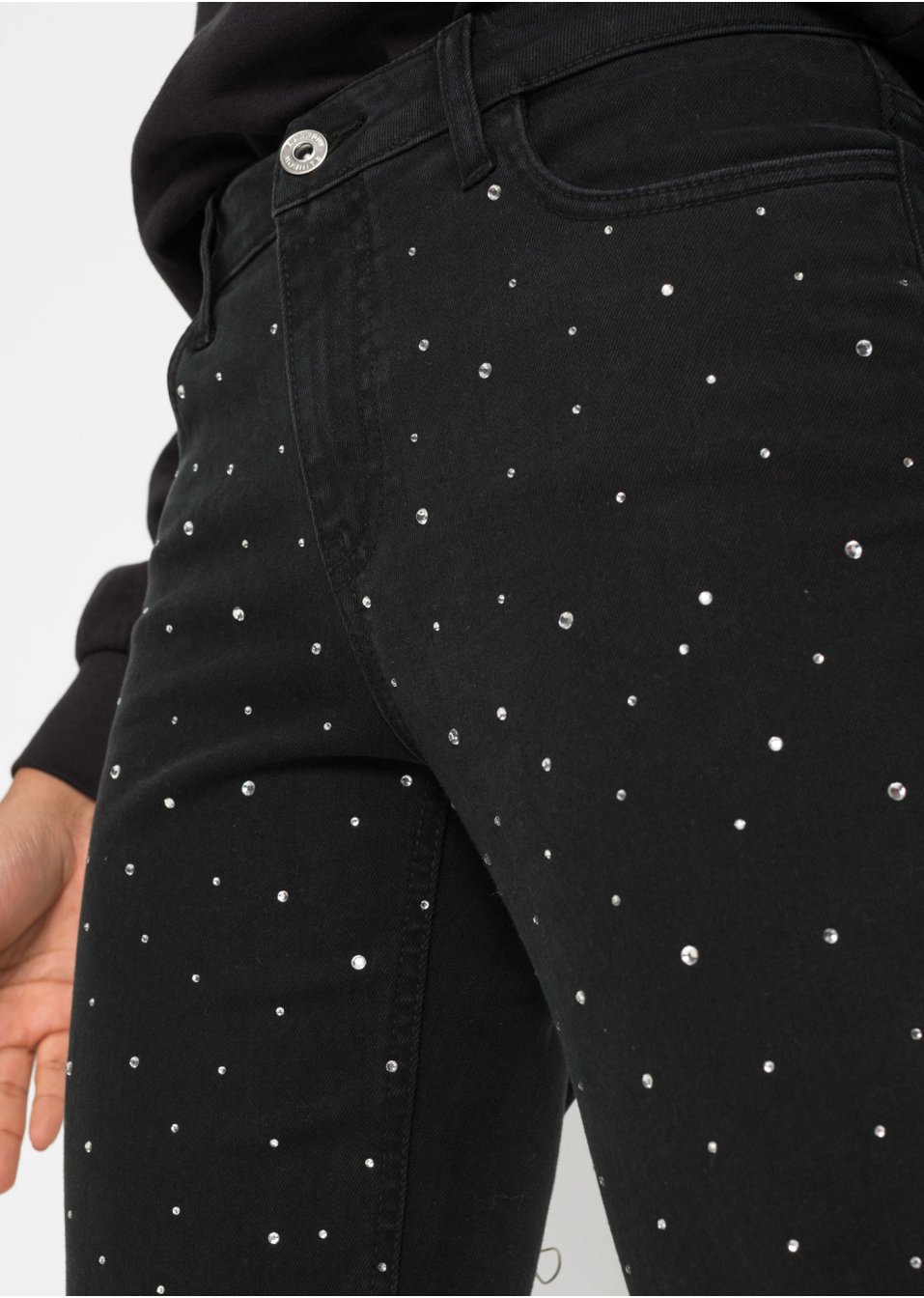Pantalon extensible avec pierres brillantes