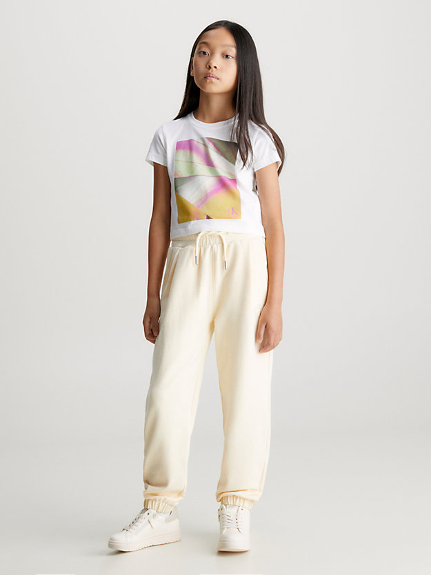 Calça de moletom macia com pregas e modelagem relaxada.