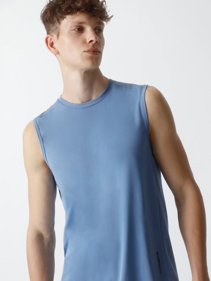 Camiseta esportiva sem mangas - Azul Índigo Claro