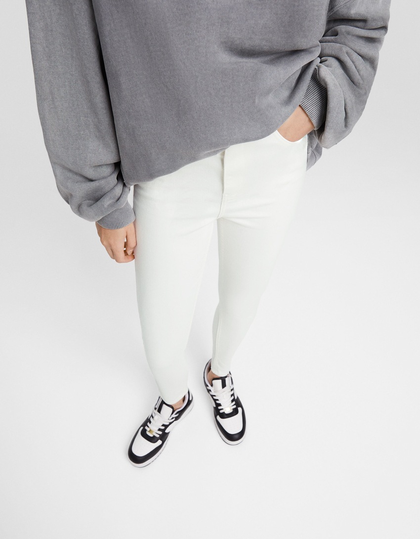 calça jeans skinny de cintura super alta