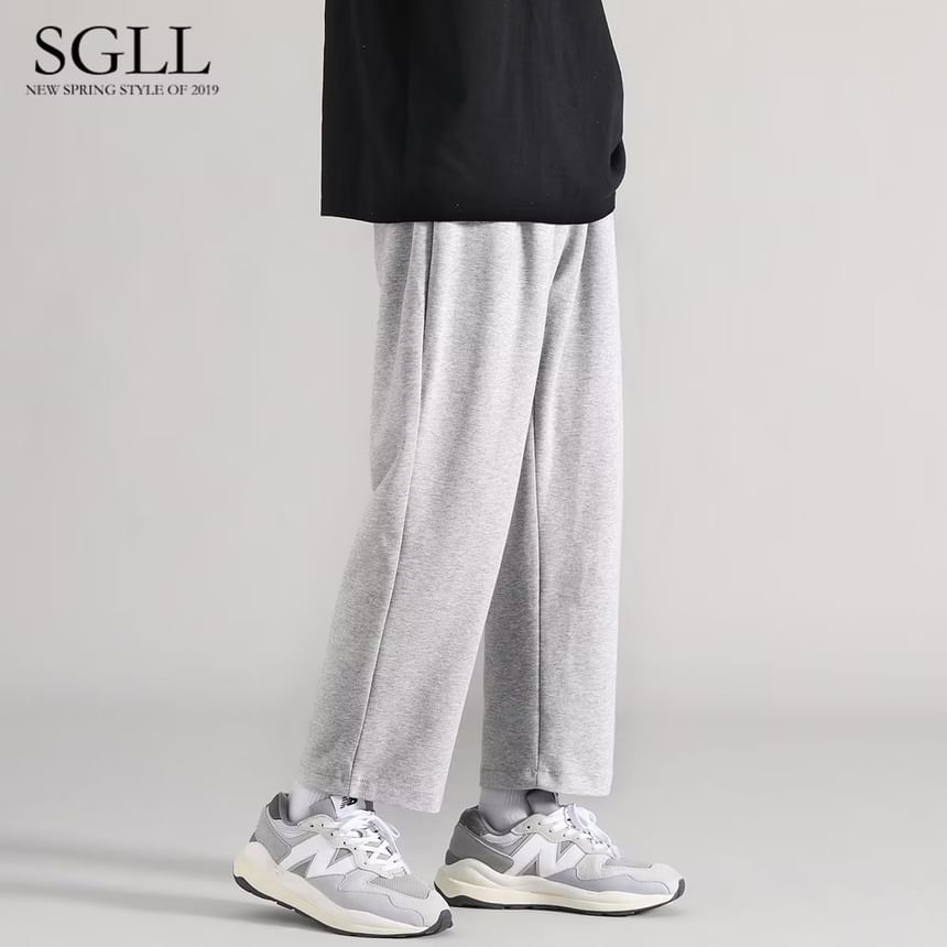 Jozev - Effen cropped rechte joggingbroek met trekkoord in de taille