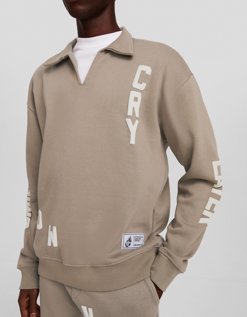 Moletom estampado com gola polo