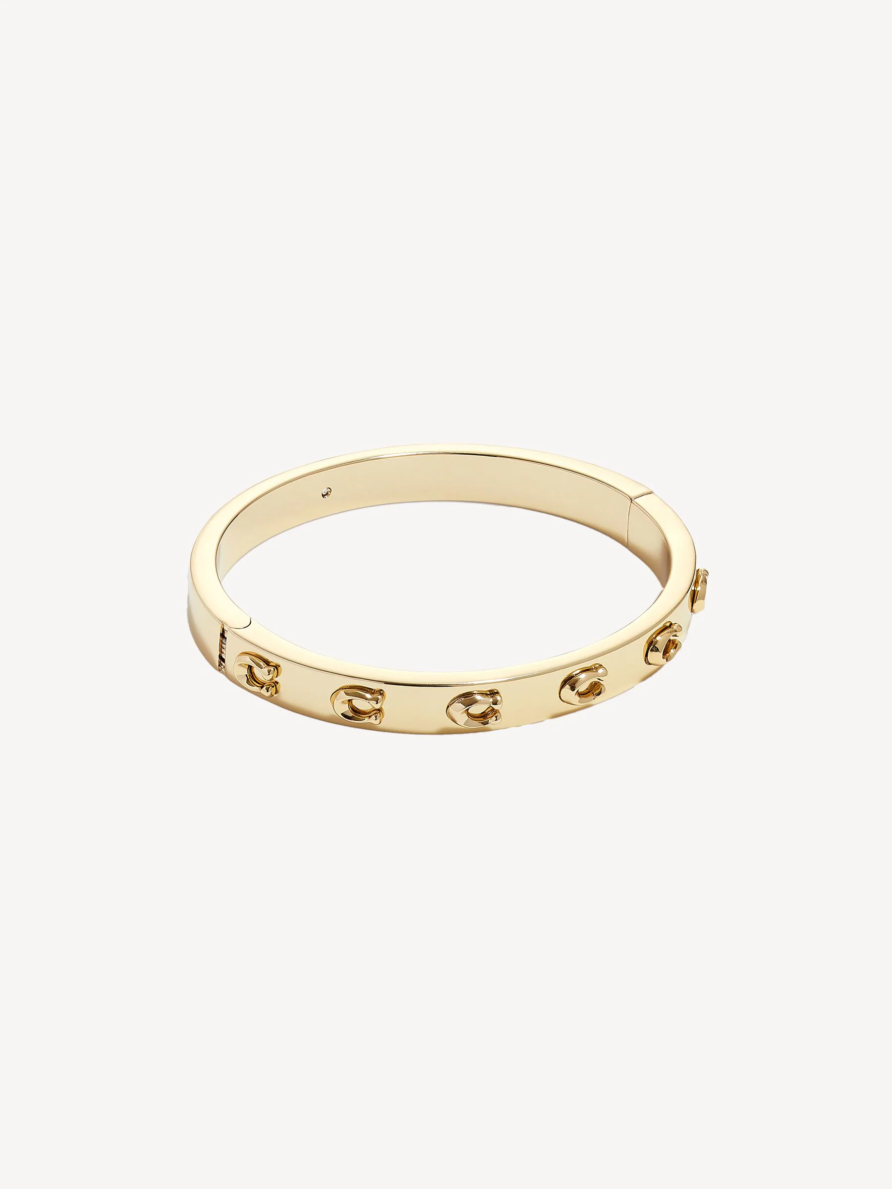 Goud - COACH - Tweekleurige Signature C armband met scharnier