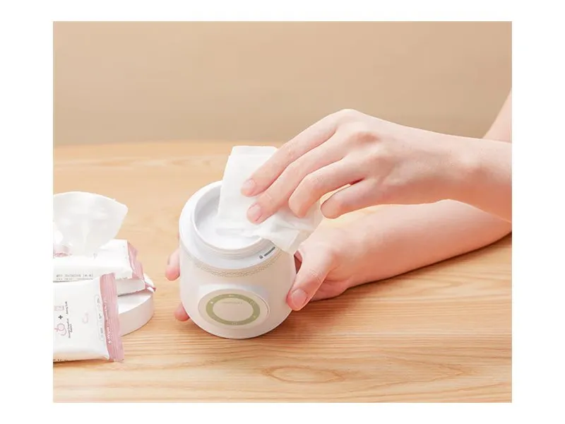 BÆRBAR SUTTEFLASKEVARMER MOMCOZY MW03