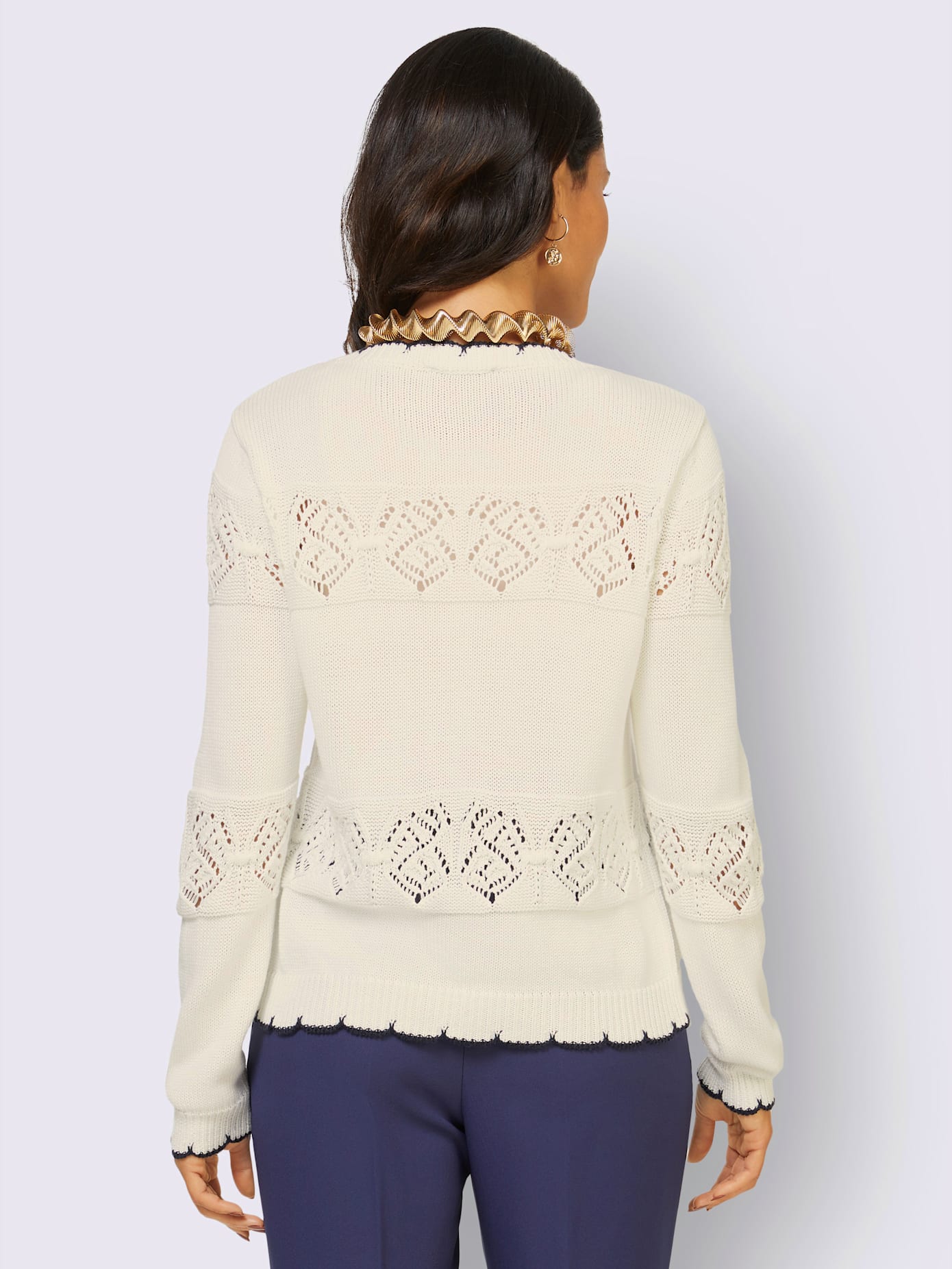 Veste en tricot avec motif ajouré