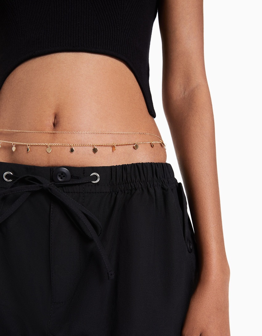 Corrente de barriga com círculos