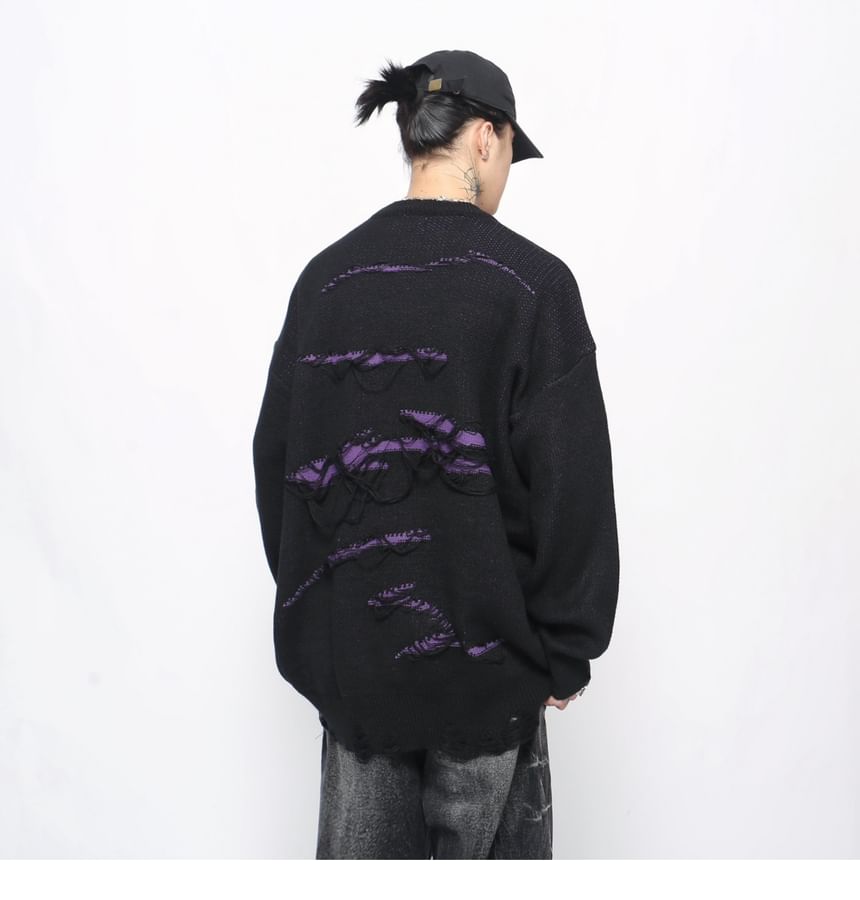 Derbundy - Oversized trui met ronde hals en distressed letters