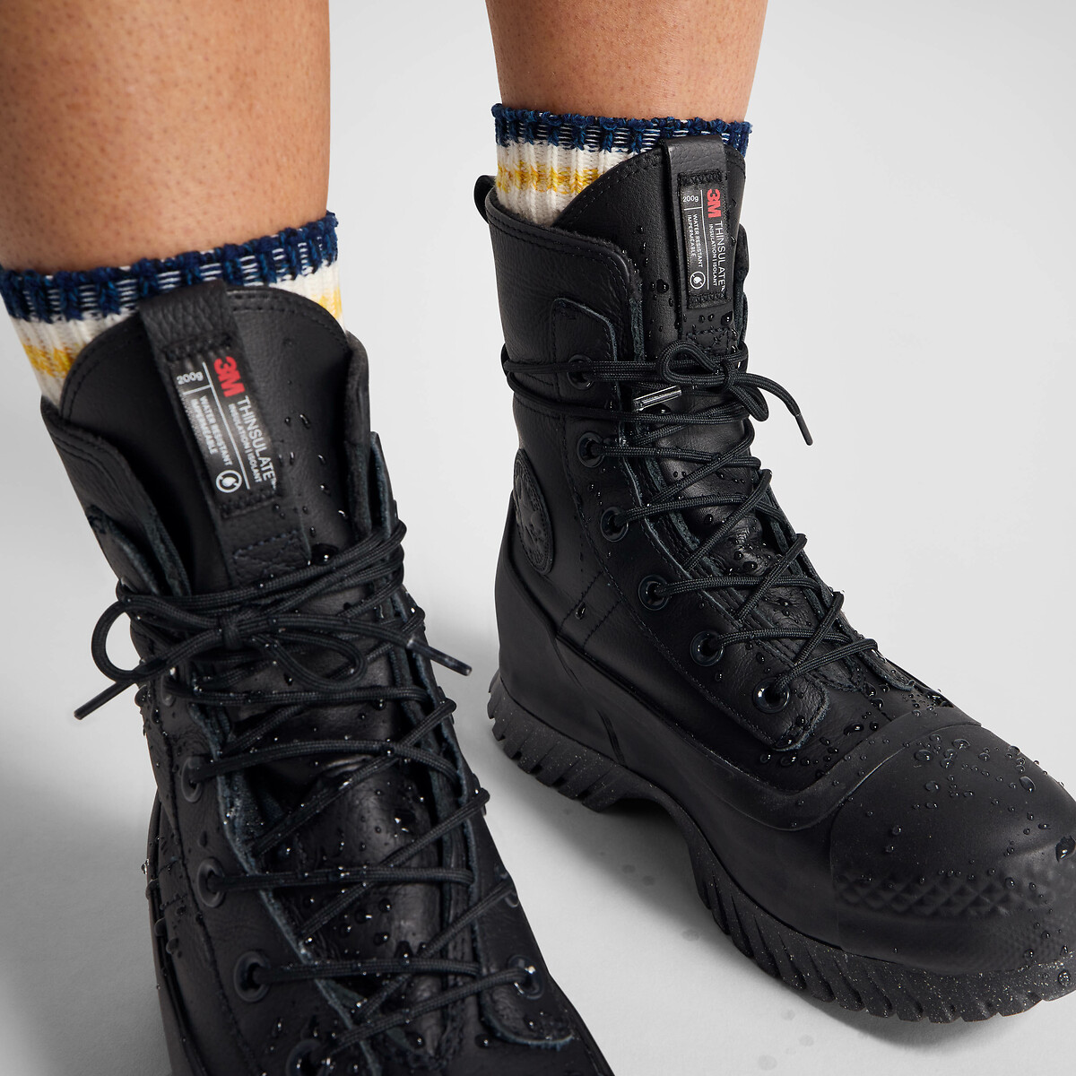 CONVERSE<br>Botas de cano curto em couro com salto baixo