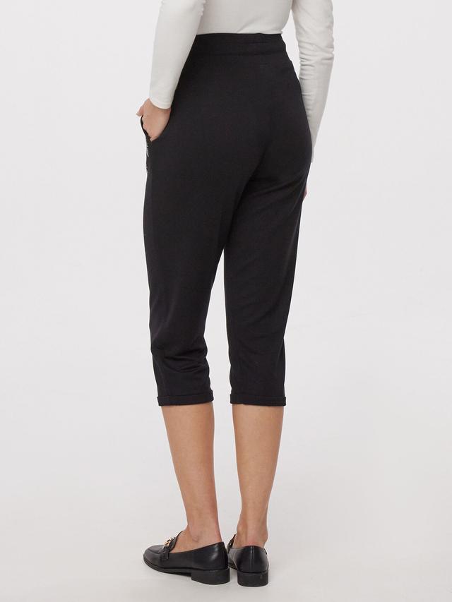 Caprijogpants Palmenmotiv