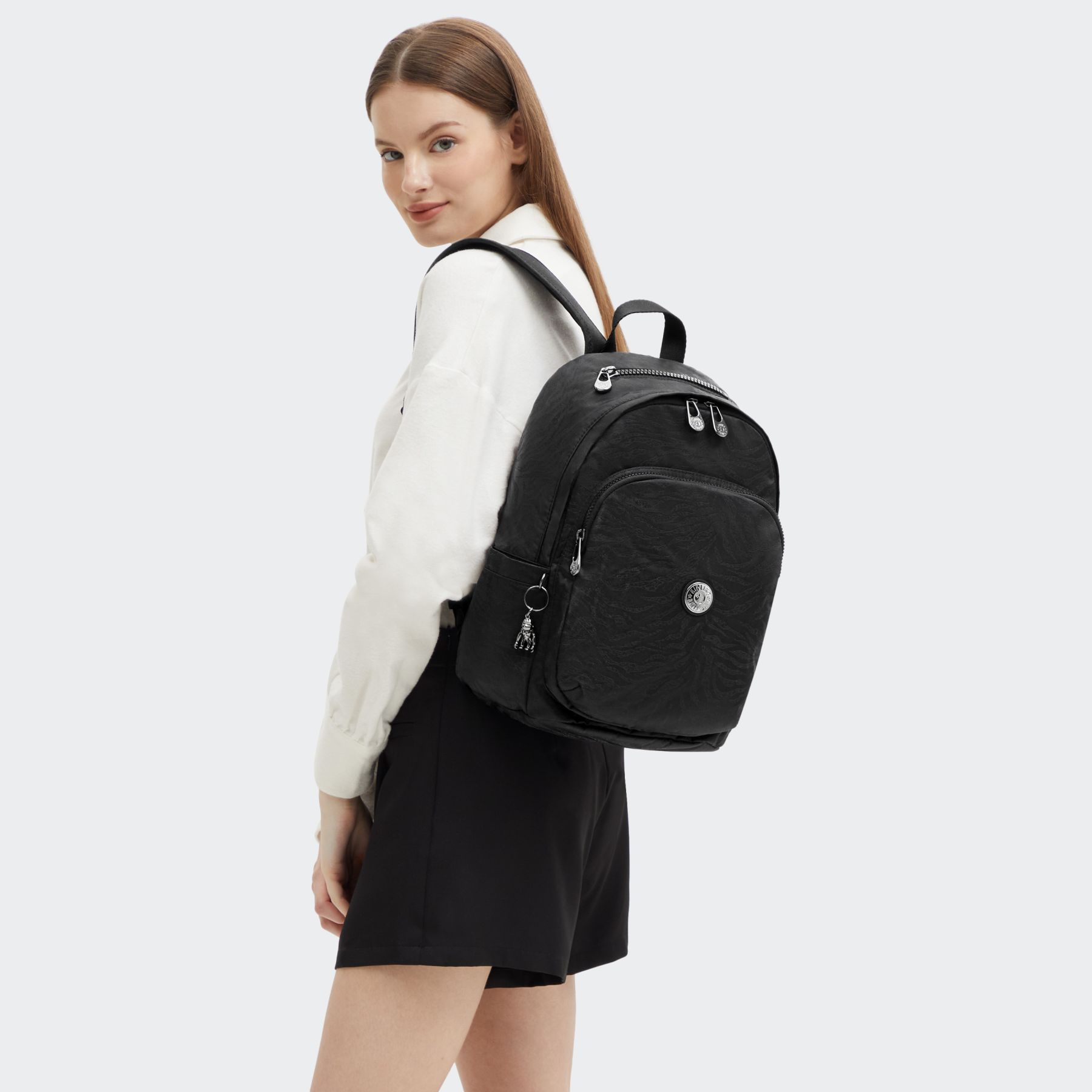 DELIA Sac à Dos Moyen avec Poche Frontale et Poignée Supérieure - Undersea Jacquard