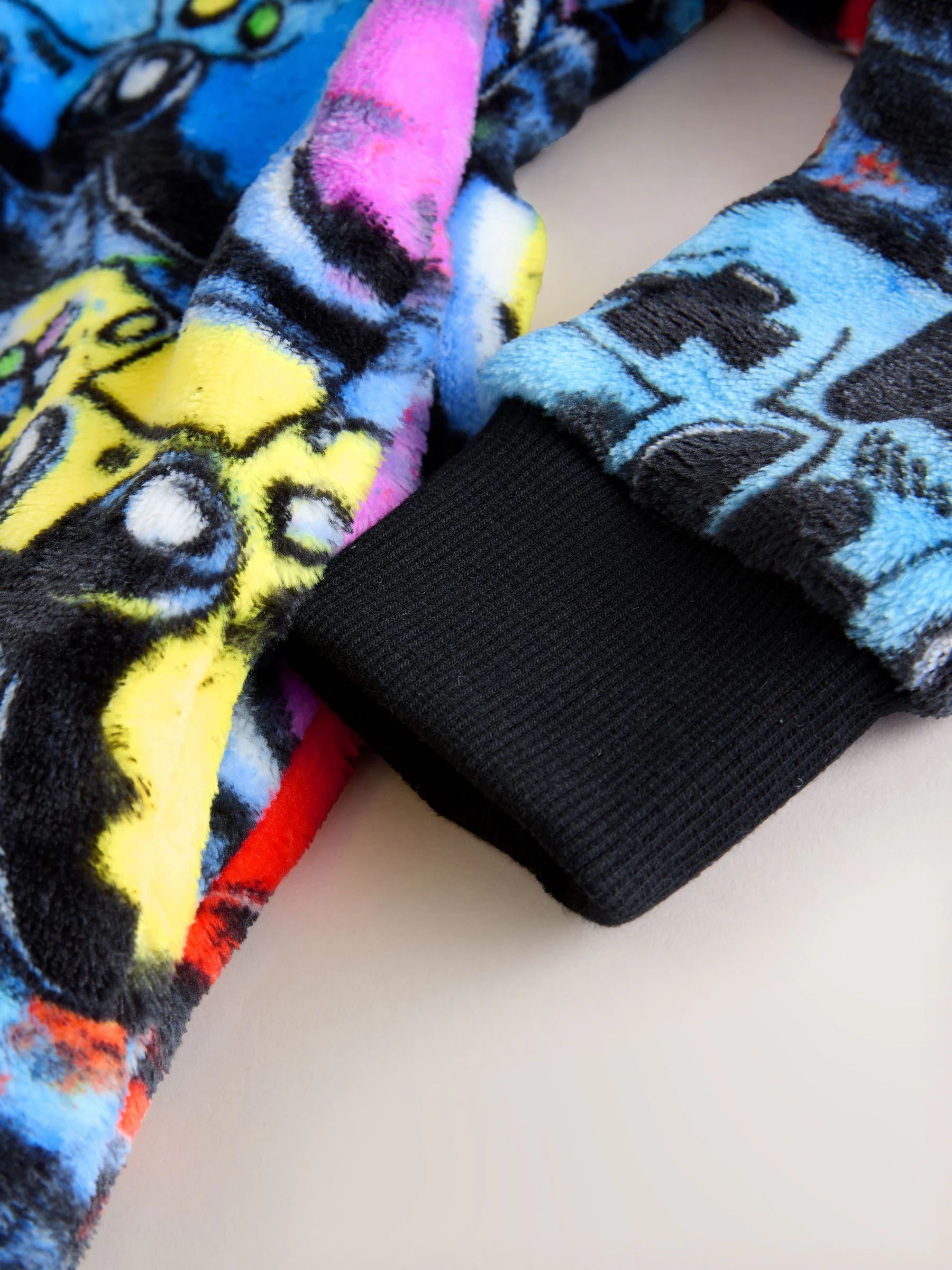 Meerkleurige Gamer - Fleece onesie (3-16 jr)