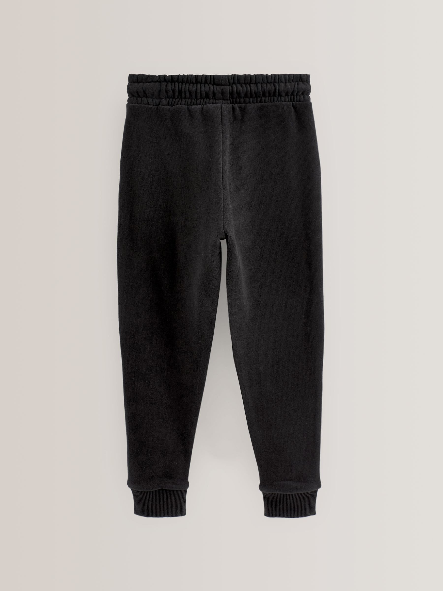 Zwart - Zachte jersey joggingbroek met normale pasvorm (3-16jr)