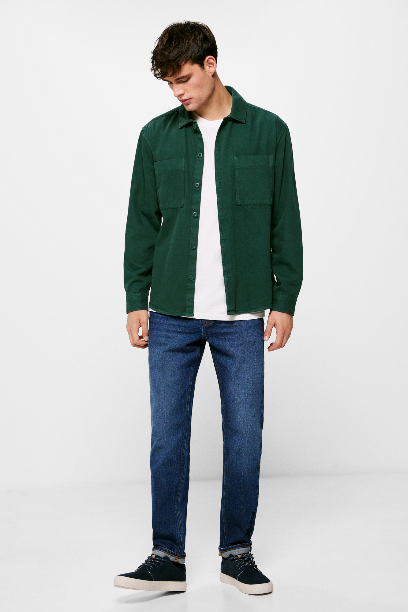 Calça jeans slim, lavagem média escura