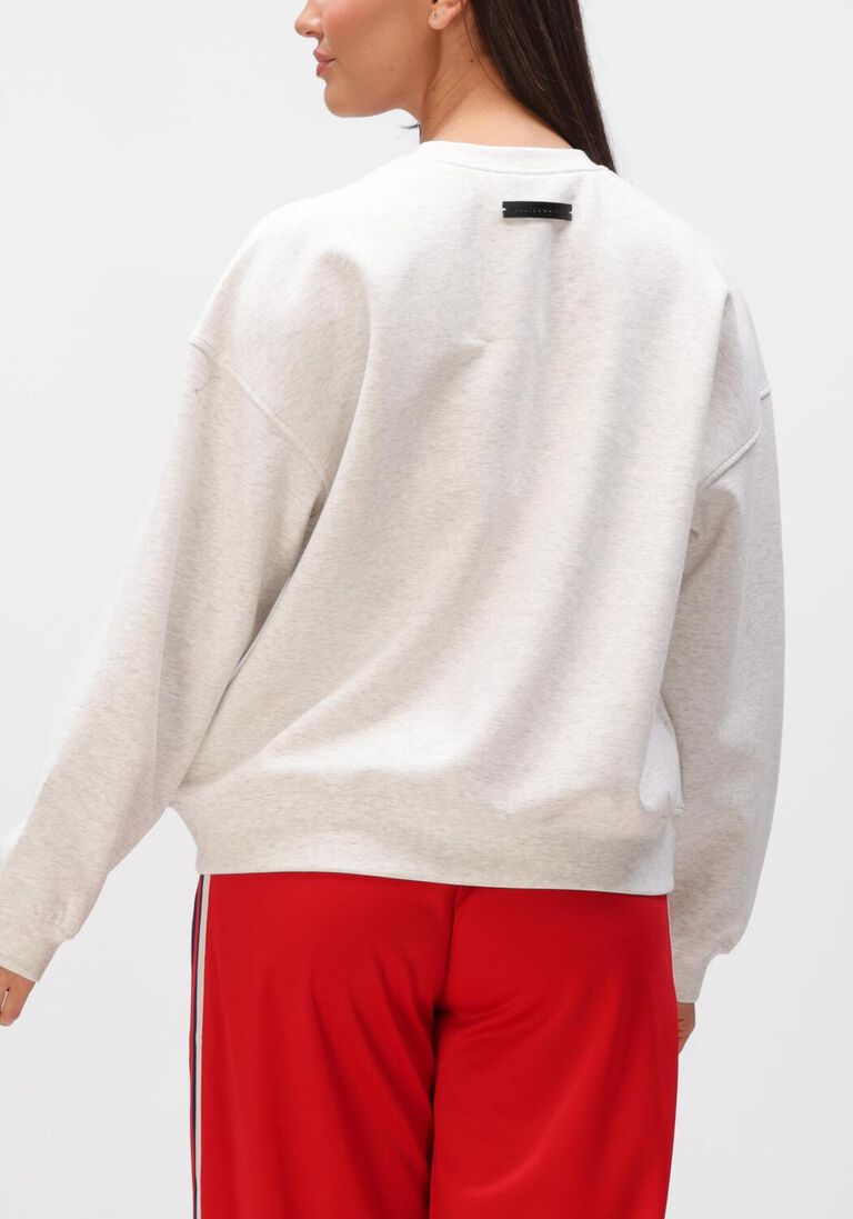 lichtgrijze haute l'amitié sweater studio logo sweat