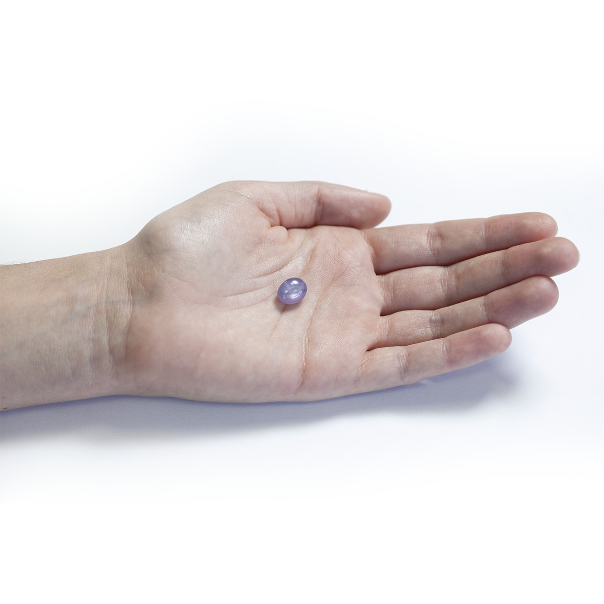 Saphir violet, fome cabochon, étoilé, 6.85 ct.