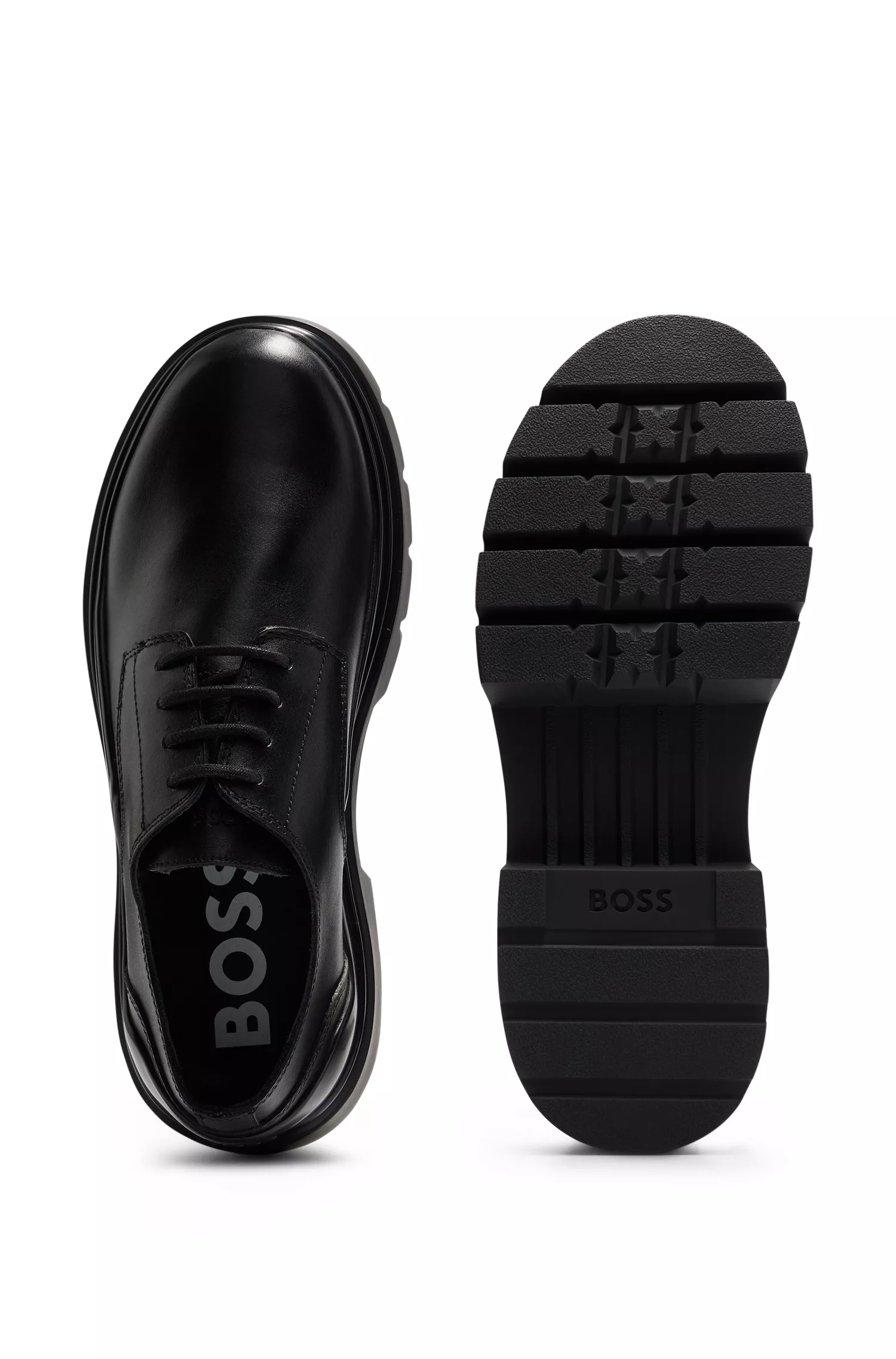 Sapatos Derby BOSS em couro preto com sola robusta.