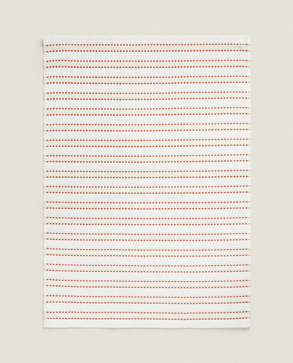 Pano de prato de tecido atoalhado com costura decorativa