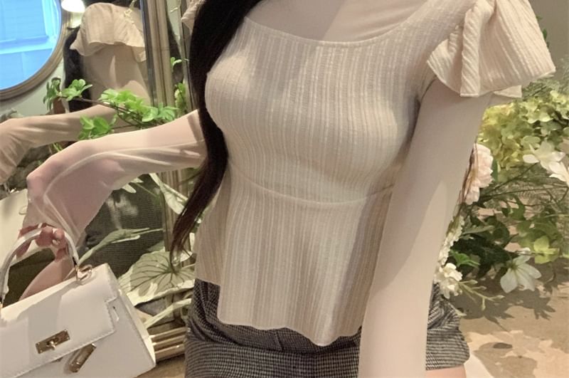 Gilmort - Lange mouwen coltrui effen peplum geribbelde gebreide top